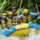 Rombongan rafting di Sungai Ayung dengan latar hijau Ubud
